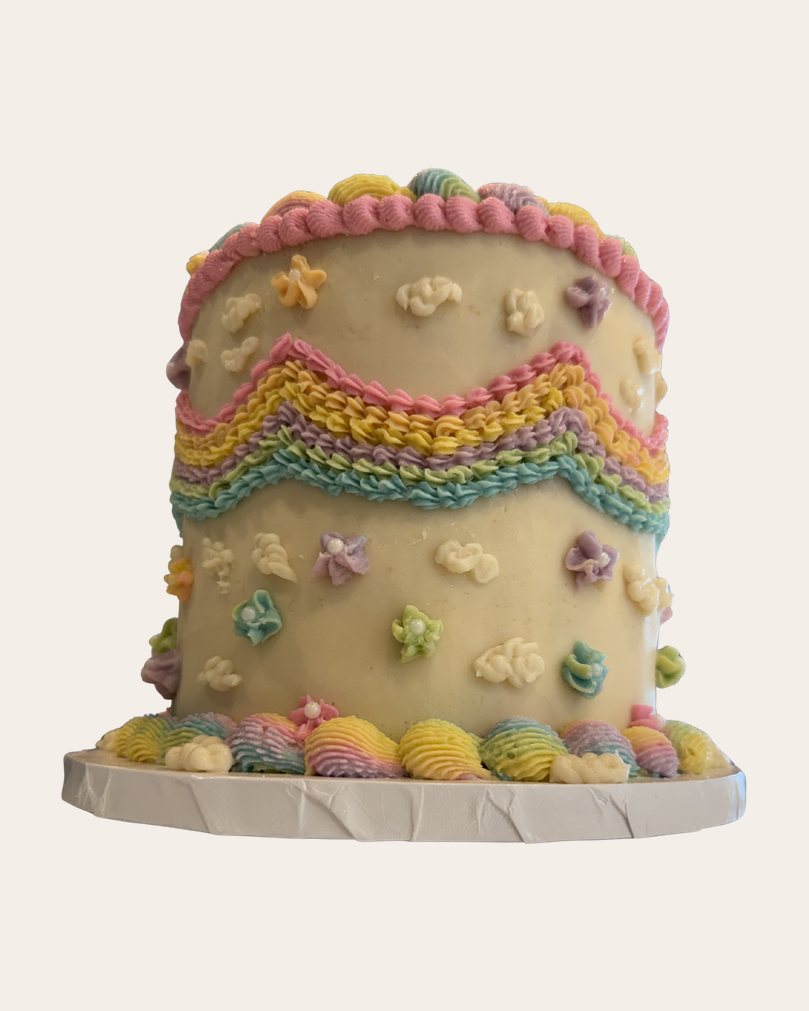 Tall cake with colorful vintage piping